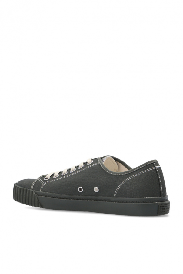 Closed rounded toe sneaker with textile and synthetic uppers Closed rounded toe sneaker with textile and synthetic uppers